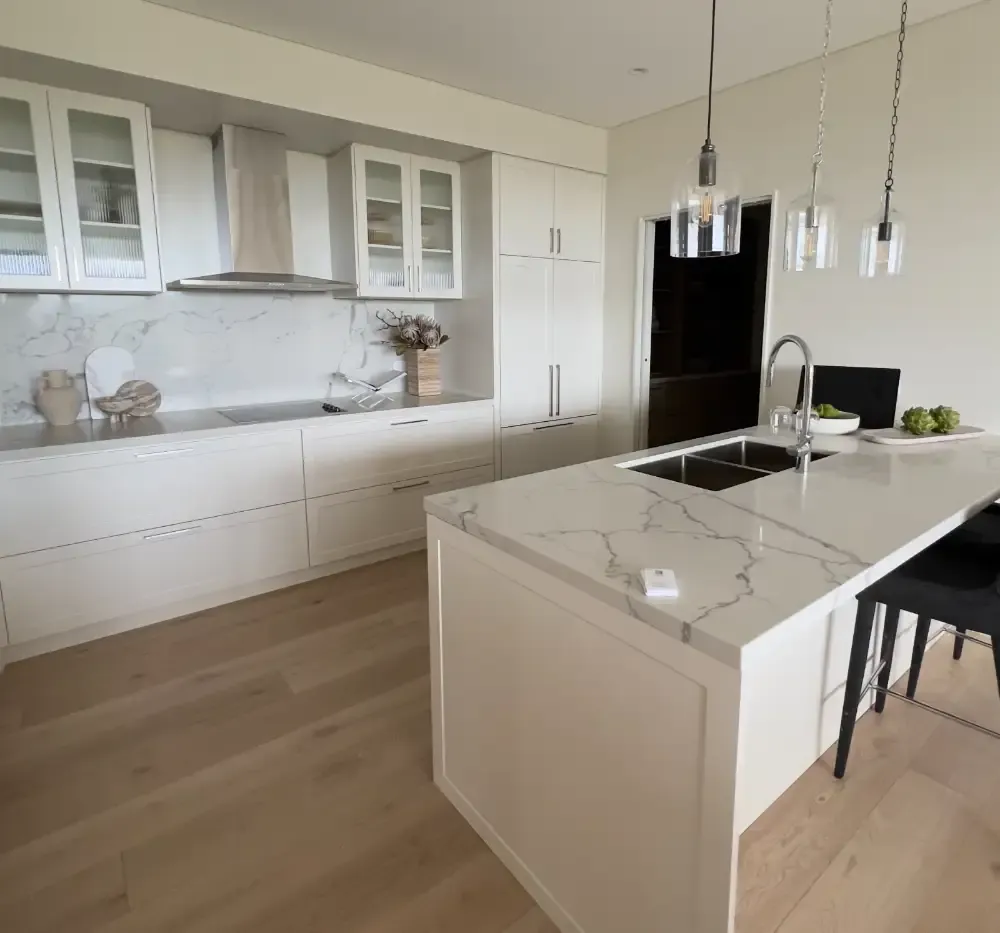 Kitchen island and timber floor in a rental home